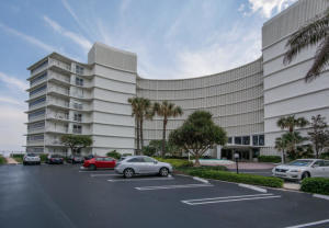 2780 South Ocean Boulevard, Unit 312 Palm Beach, FL 33480 - Photo 28 of 29 a car parked in front of a building