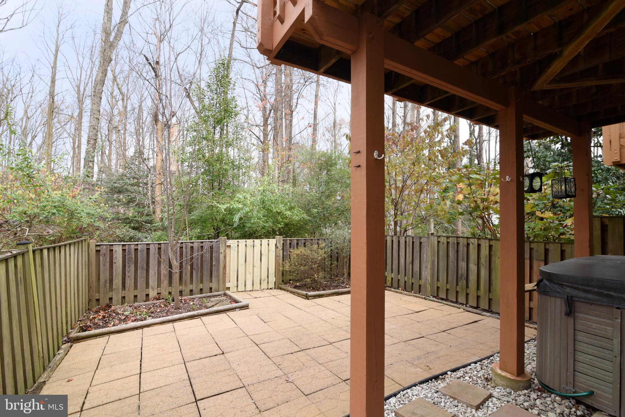 2334 Generation Drive Reston, VA 20191 - Photo 49 of 55 a view of a porch with wooden floor