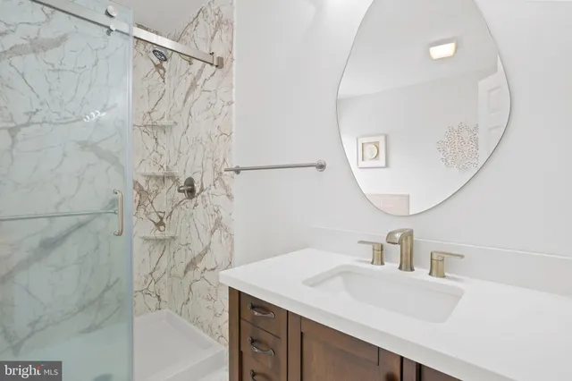 a white bath tub sitting in a bathroom