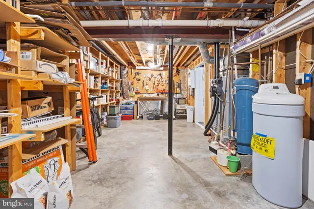 a view of living room filled with furniture and furniture