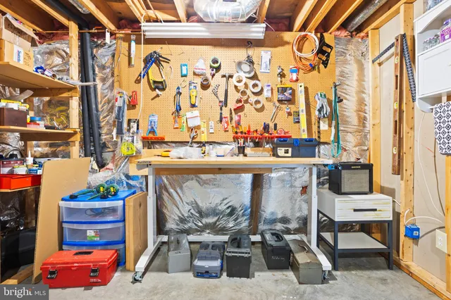 a room with furniture and a flat screen tv