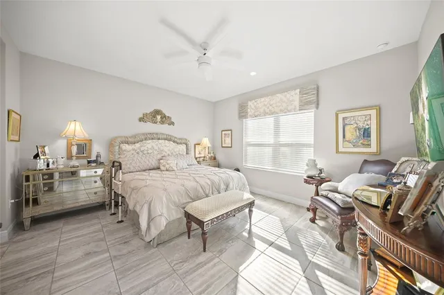 a bathroom with a double vanity sink mirror and shower