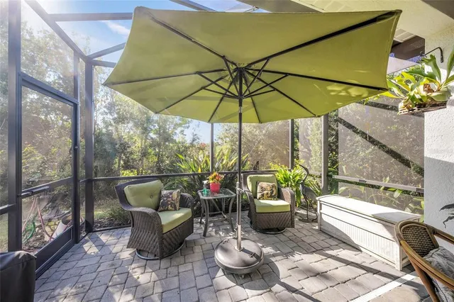 a view of a backyard with plants and a garden