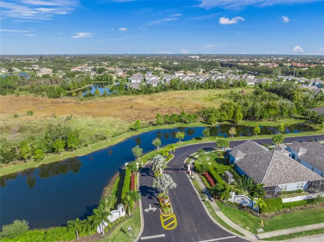 an aerial view of a house with outdoor space