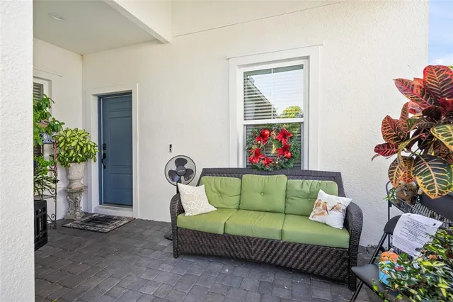 a view of porch with wooden floor