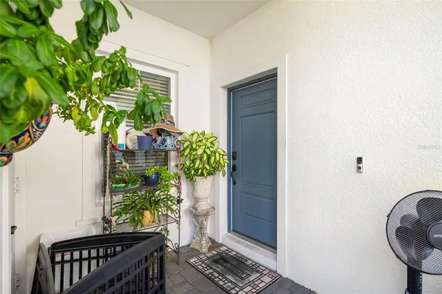 an aerial view of a house with yard
