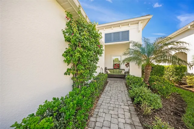 a view of a backyard of the house