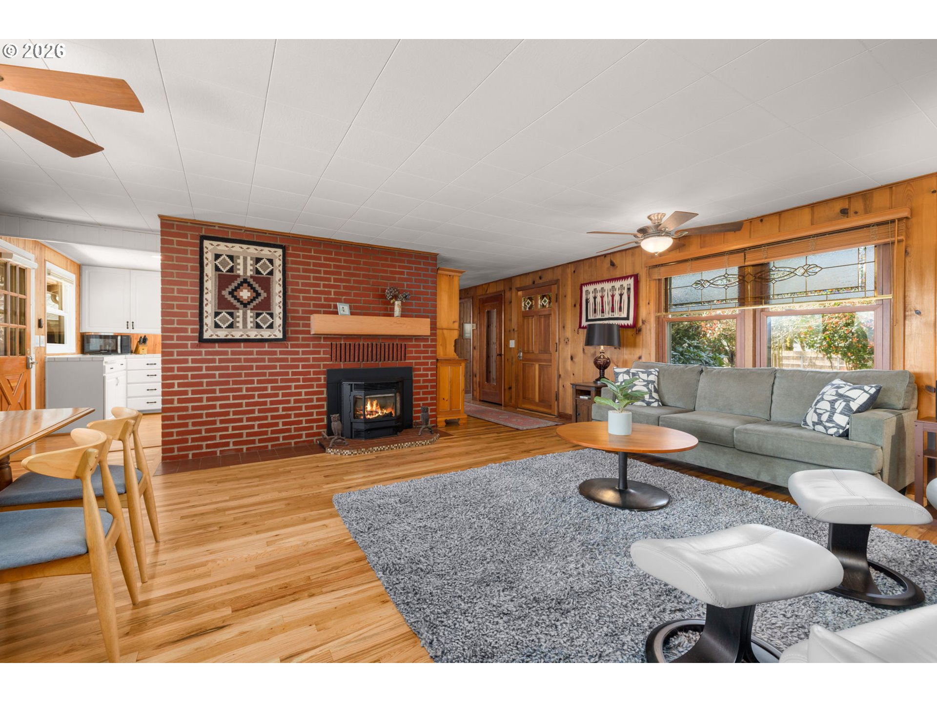 15880 Southeast Bluff Road Sandy, OR 97055 - Photo 11 of 47 a living room with furniture and a fireplace