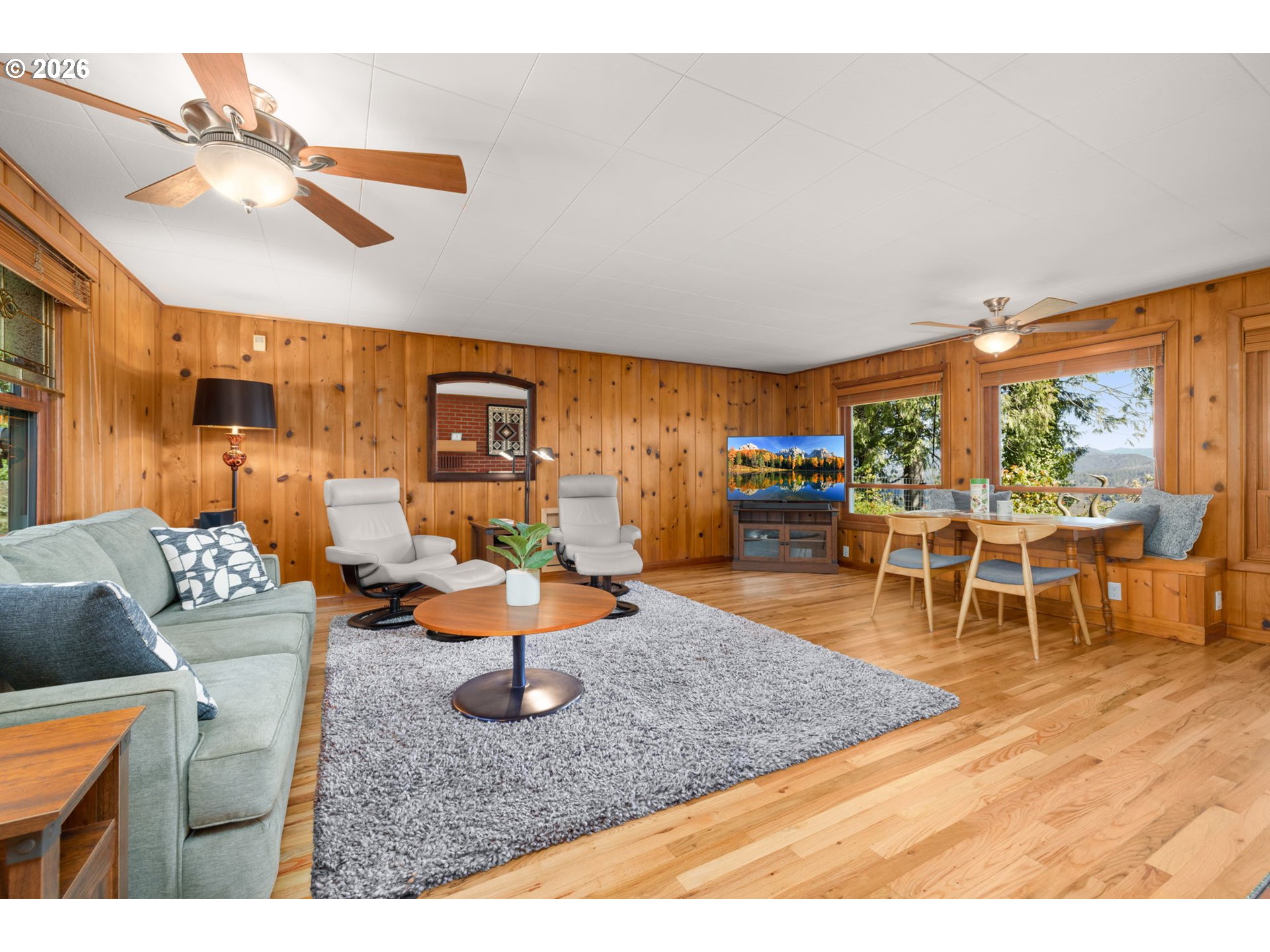 15880 Southeast Bluff Road Sandy, OR 97055 - Photo 12 of 47 a living room with furniture and wooden floor