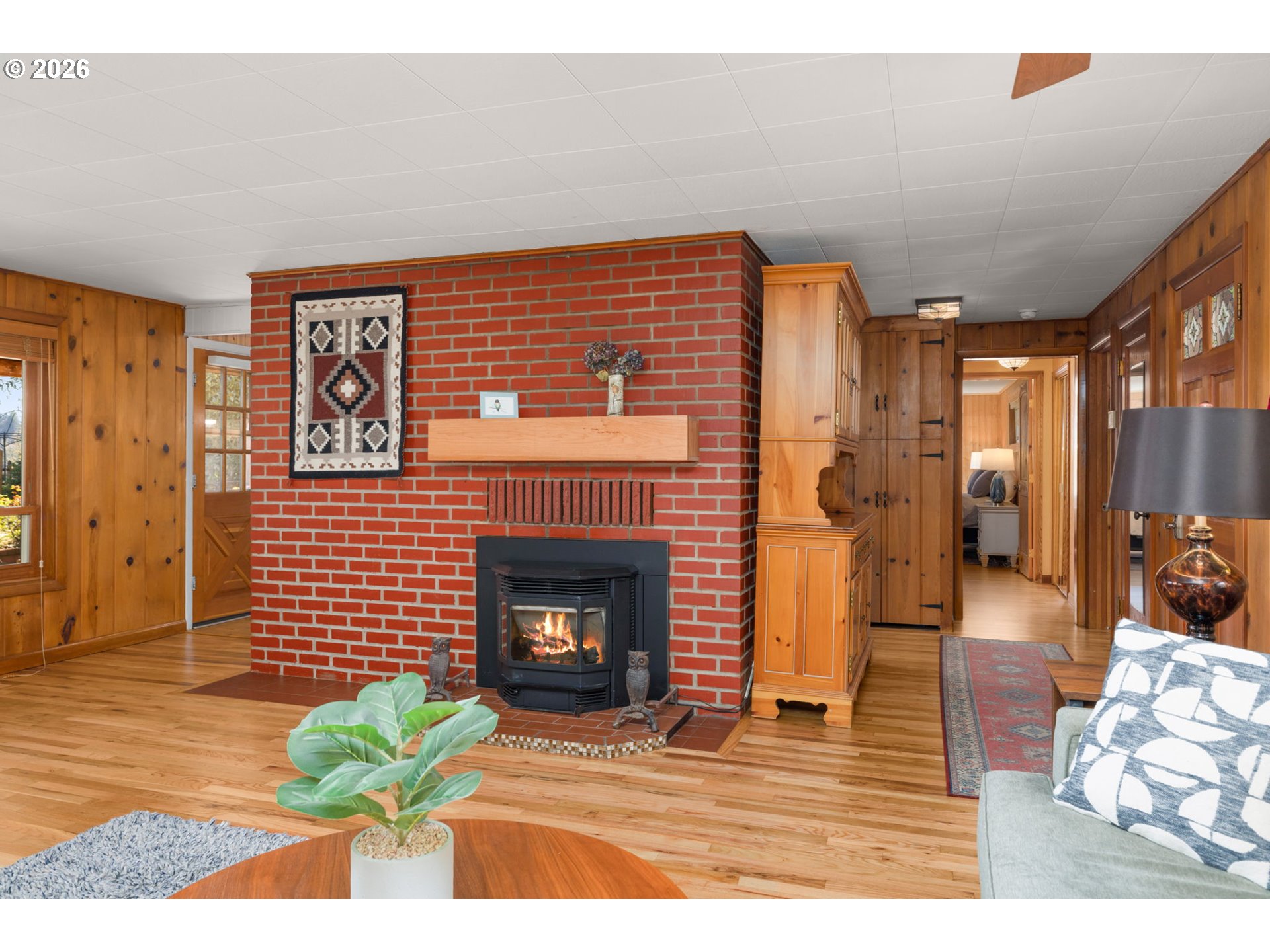 15880 Southeast Bluff Road Sandy, OR 97055 - Photo 15 of 47 a living room with furniture a fireplace and a fireplace