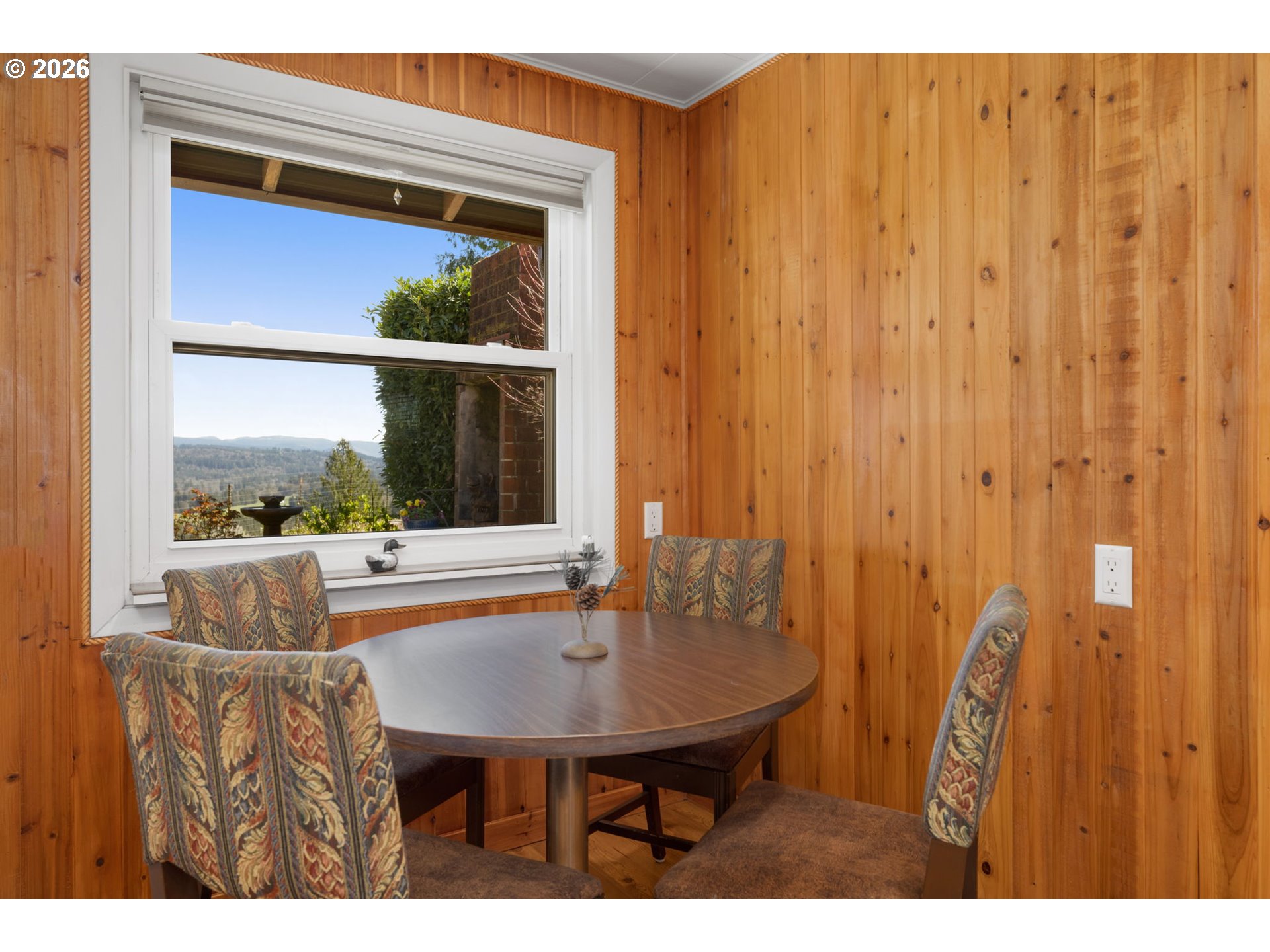 15880 Southeast Bluff Road Sandy, OR 97055 - Photo 18 of 47 a view of a room with a table and chairs