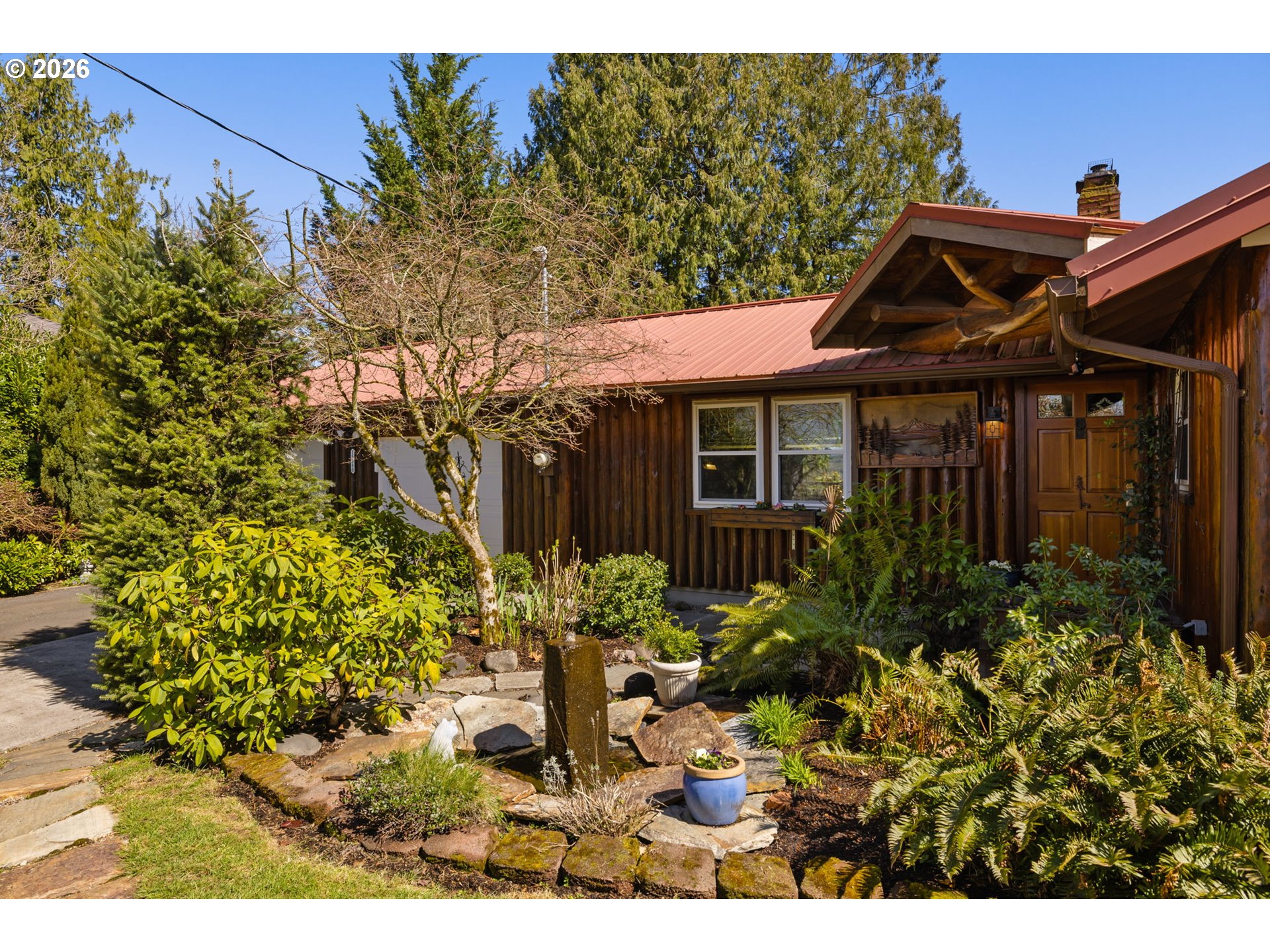15880 Southeast Bluff Road Sandy, OR 97055 - Photo 47 of 47 a front view of a house with a yard
