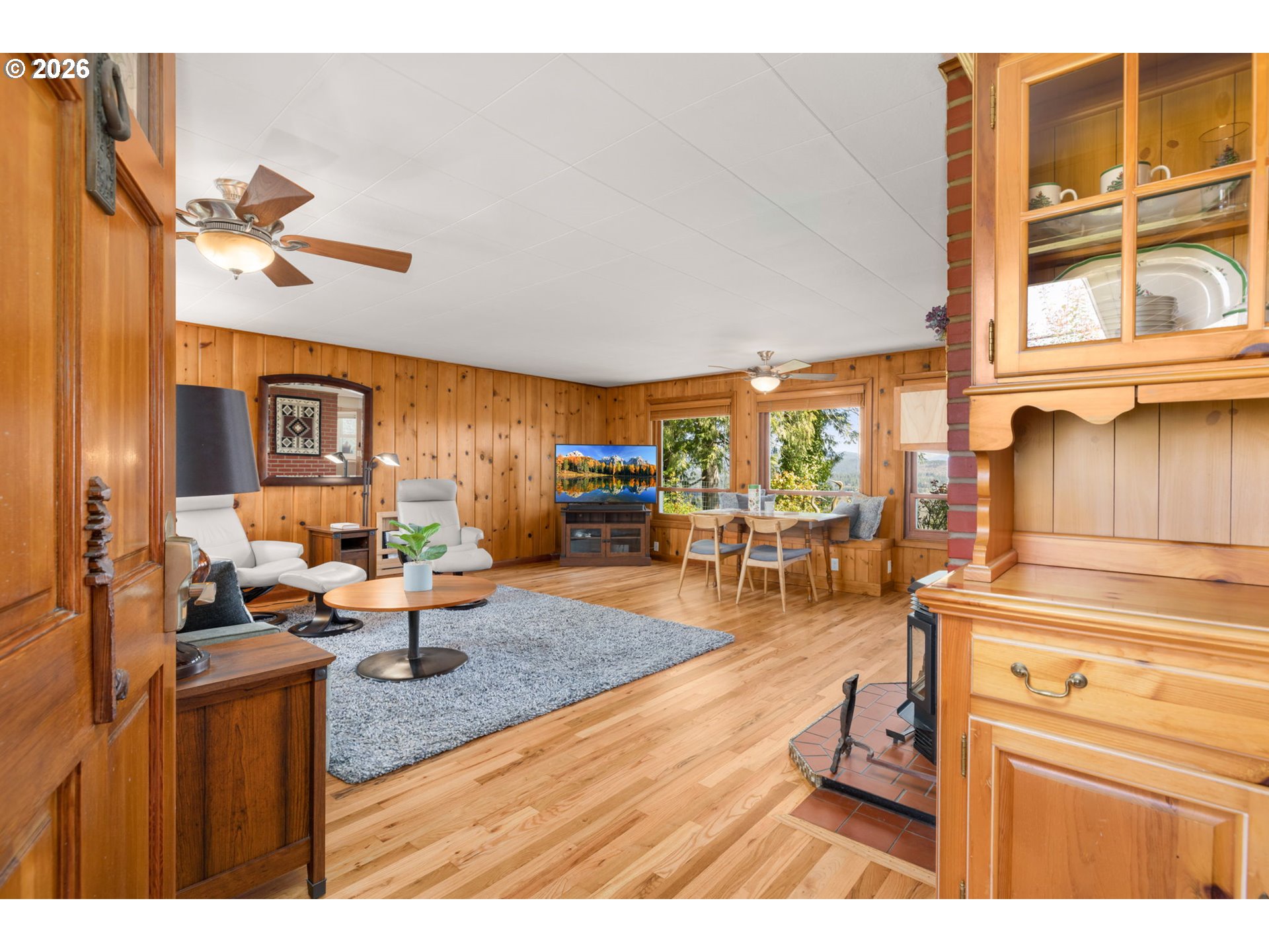 15880 Southeast Bluff Road Sandy, OR 97055 - Photo 10 of 47 a living room with furniture a rug and a window