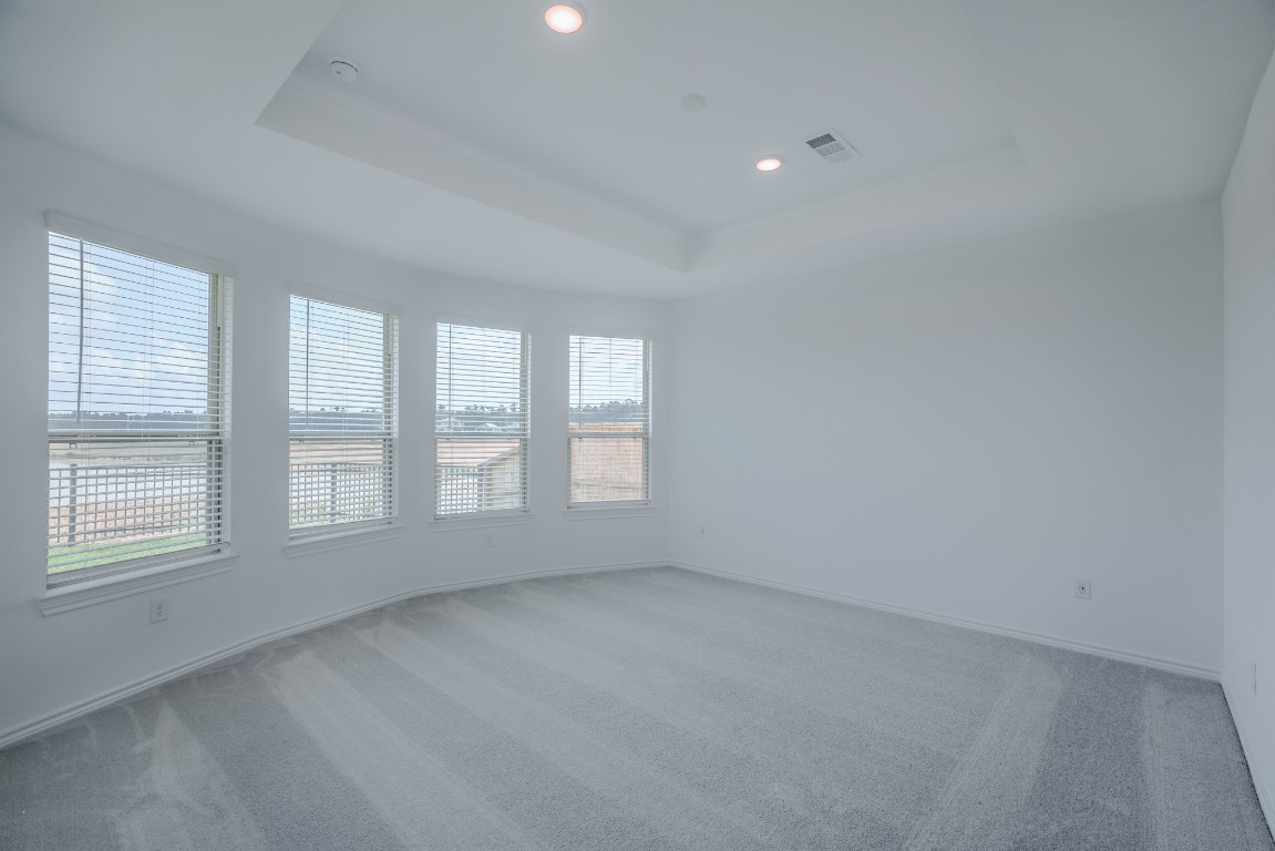 15135 Wild Gully Way Conroe, TX 77302 - Photo 12 of 42 an empty room with a window