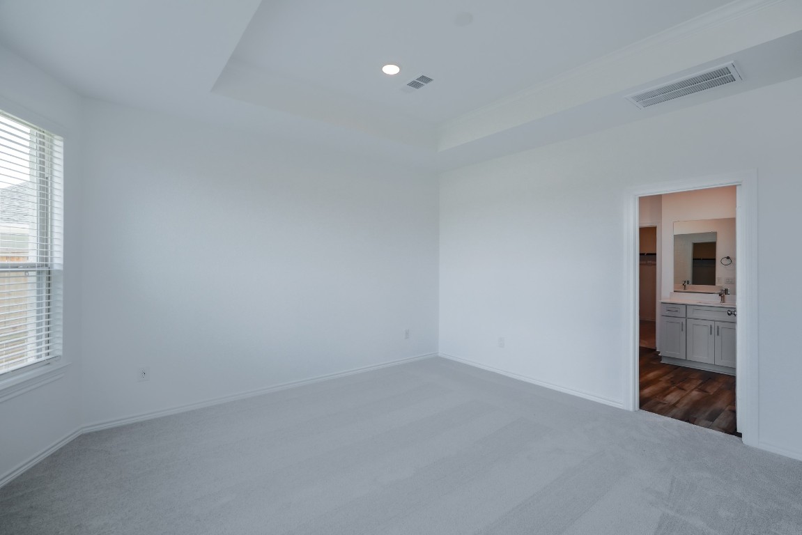 15135 Wild Gully Way Conroe, TX 77302 - Photo 20 of 42 an empty room with a window