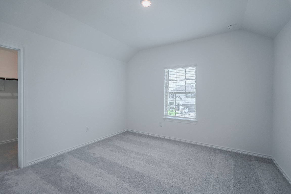 15135 Wild Gully Way Conroe, TX 77302 - Photo 26 of 42 an empty room with a window