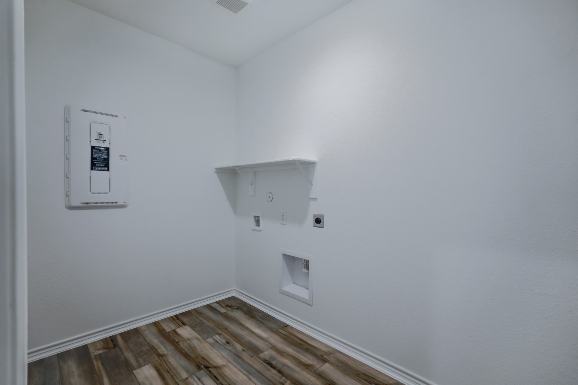 15135 Wild Gully Way Conroe, TX 77302 - Photo 39 of 42 a view of small space with racks on the wall