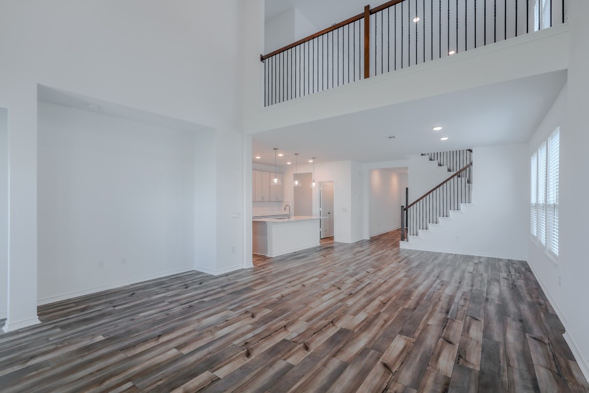 15135 Wild Gully Way Conroe, TX 77302 - Photo 4 of 42 a view of empty room with wooden floor