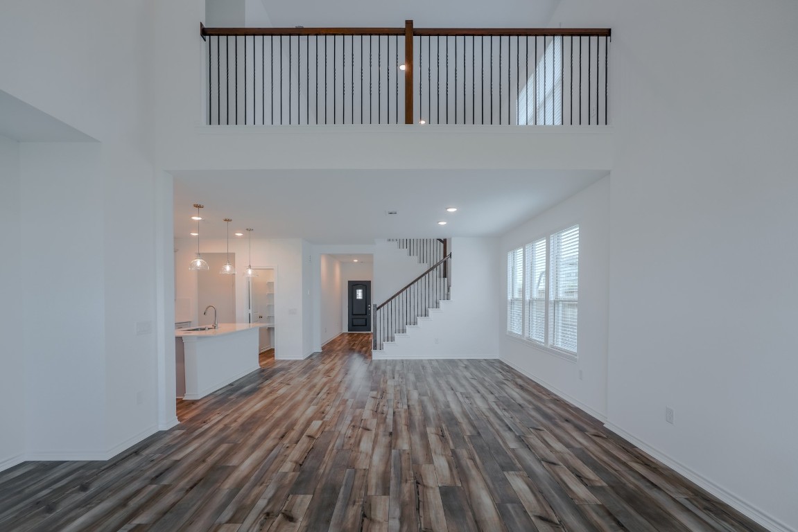 15135 Wild Gully Way Conroe, TX 77302 - Photo 6 of 42 a view of entryway and hall with wooden floor