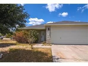 a view of a yard with an outdoor space