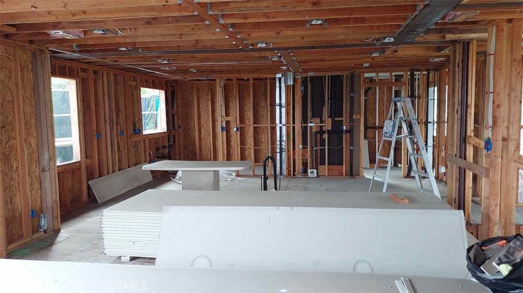 1909 Dalton Road Palos Verdes Estates, CA 90274 - Photo 17 of 28 a living room with furniture and a window