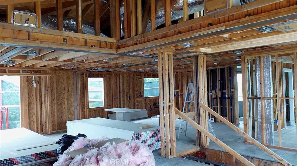 1909 Dalton Road Palos Verdes Estates, CA 90274 - Photo 18 of 28 a bedroom with furniture and large windows