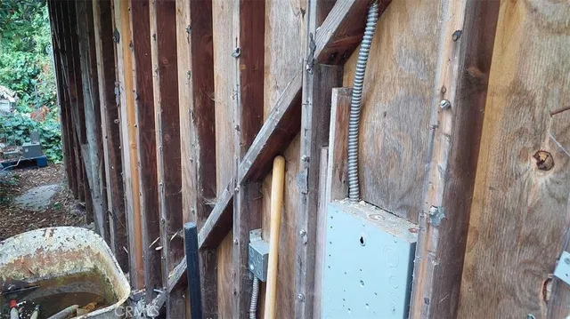 a view of a house with a tree