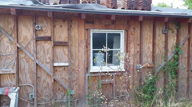 a view of a backyard of the house