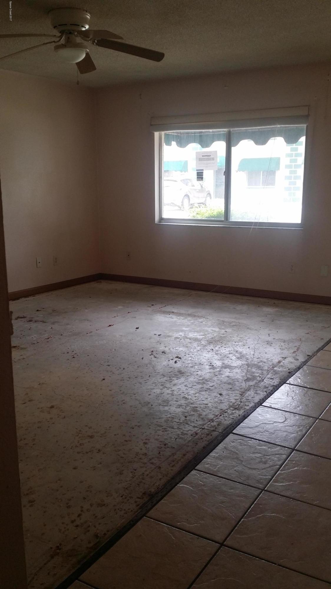 1880 Murrell Road, Unit R65 Rockledge, FL 32955 - Photo 14 of 23 Living Room