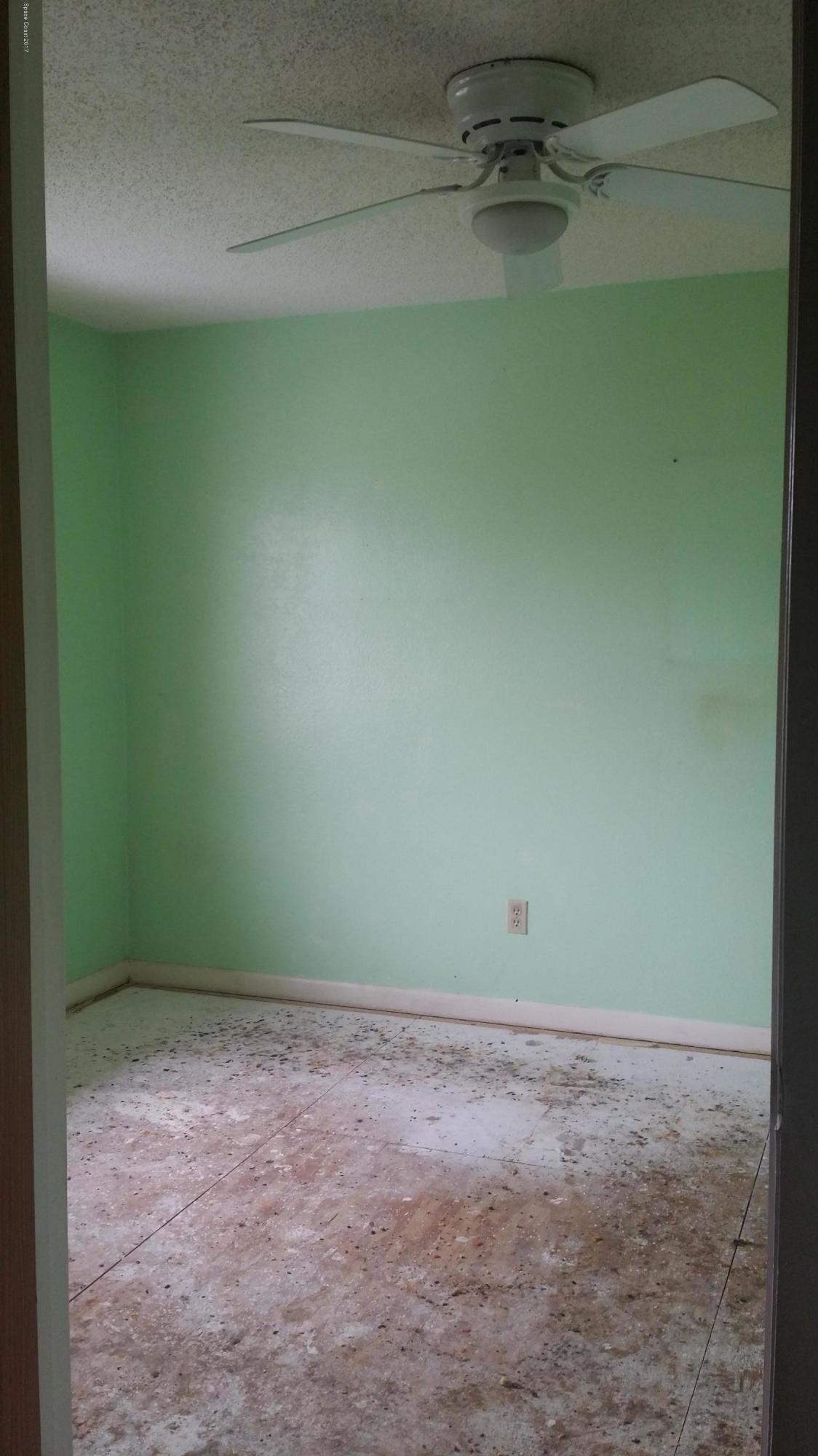 1880 Murrell Road, Unit R65 Rockledge, FL 32955 - Photo 22 of 23 Guest Room