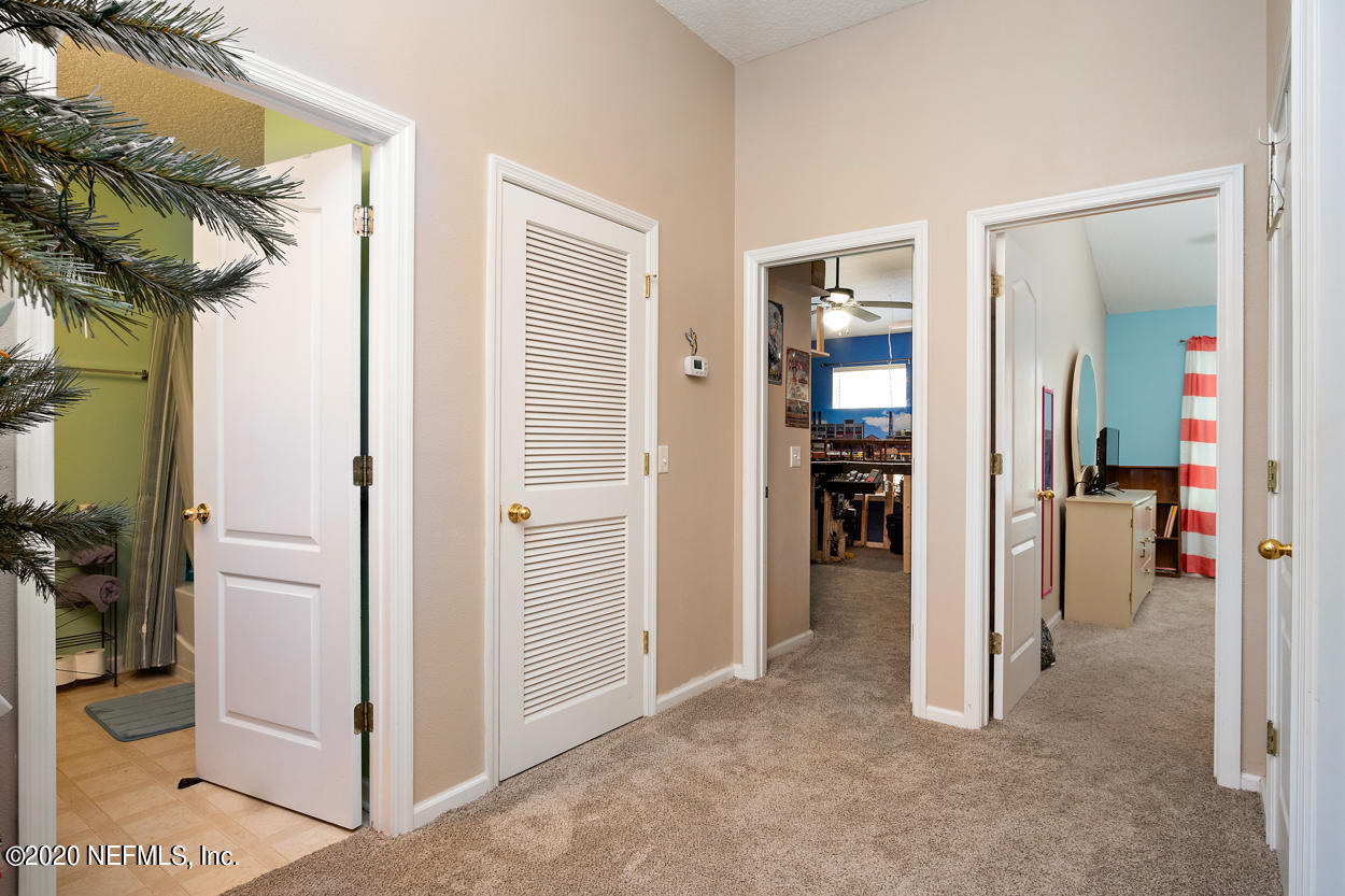 12334 Water Tupelo Road Jacksonville, FL 32226 - Photo 19 of 31 Walkway to 2nd and 3rd Bedroom