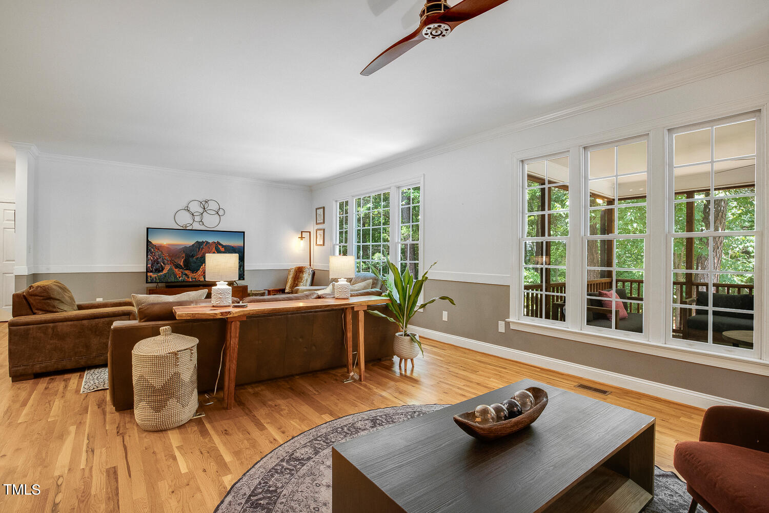 5809 Garrett Road Durham, NC 27707 - Photo 11 of 66 a living room with furniture and a large window