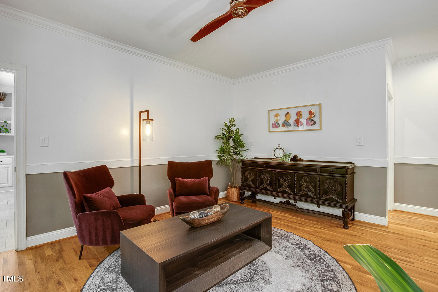 5809 Garrett Road Durham, NC 27707 - Photo 12 of 66 a living room with furniture and a wooden floor