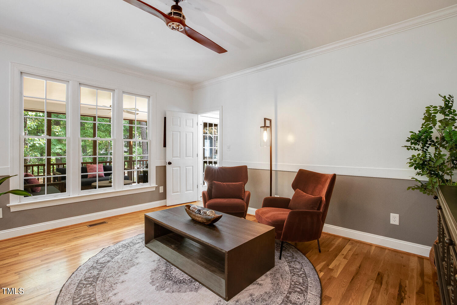 5809 Garrett Road Durham, NC 27707 - Photo 13 of 66 a living room with furniture and a large window
