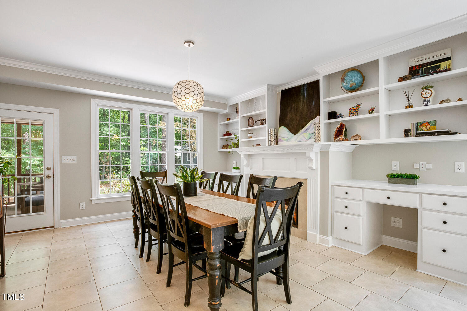 5809 Garrett Road Durham, NC 27707 - Photo 19 of 66 a view of a dining room with furniture window and outside view