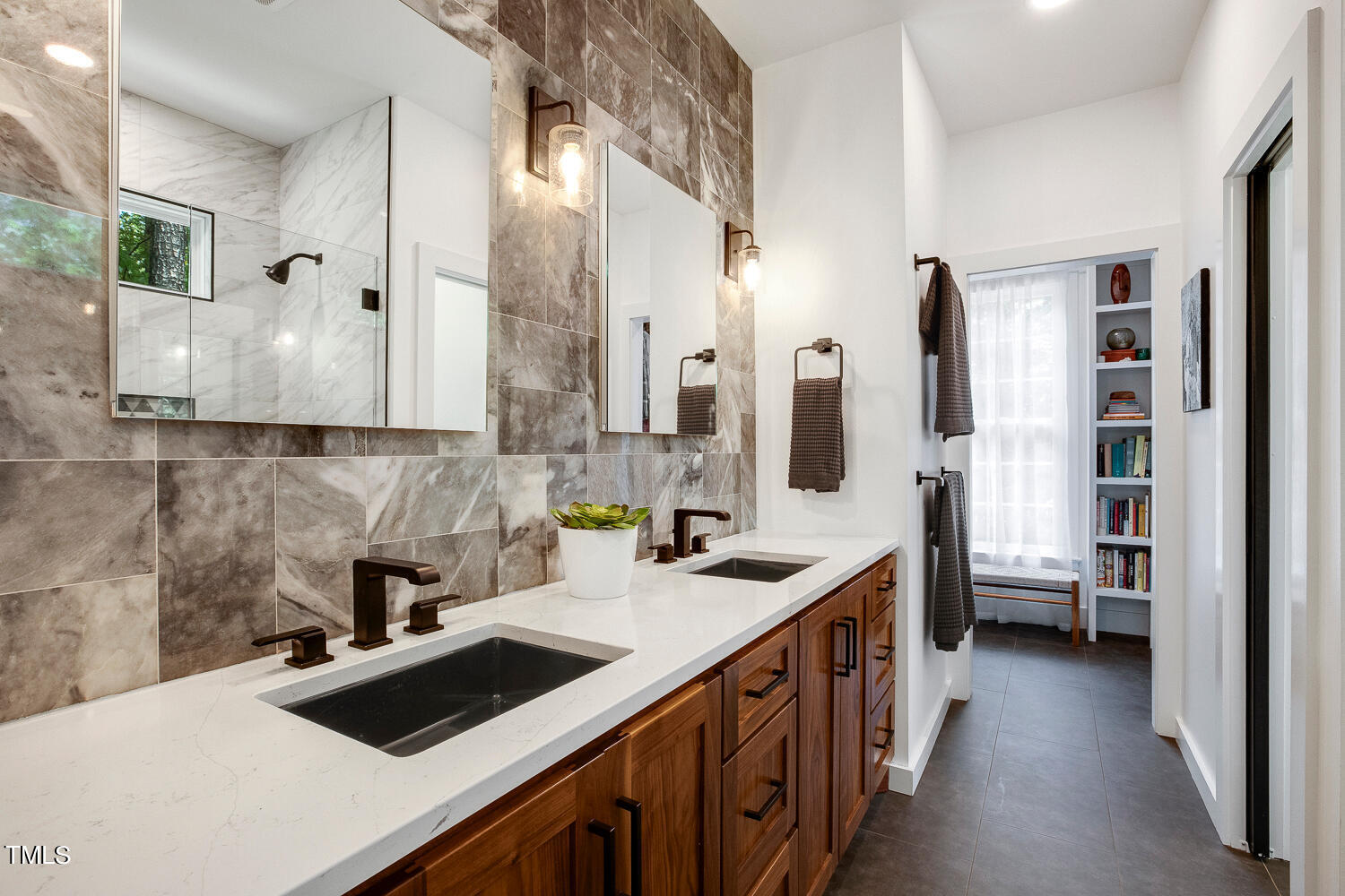 5809 Garrett Road Durham, NC 27707 - Photo 27 of 66 a kitchen with a sink a stove and cabinets