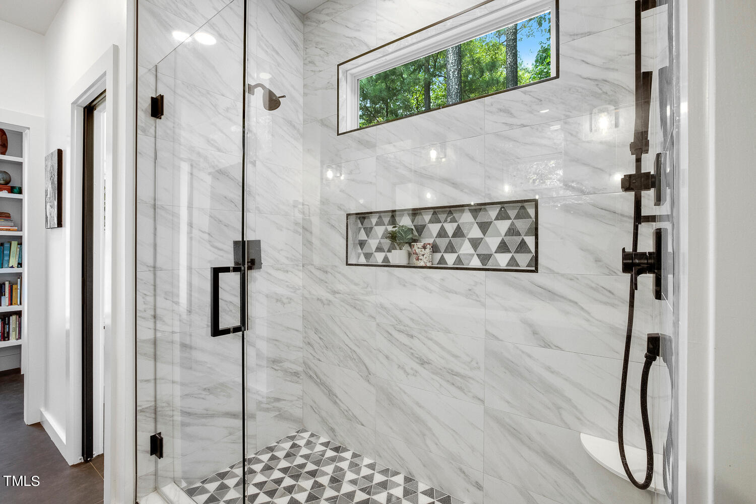 5809 Garrett Road Durham, NC 27707 - Photo 28 of 66 a bathroom with a shower