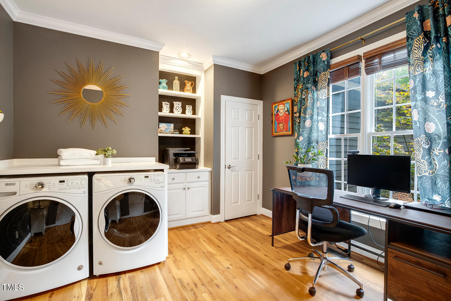5809 Garrett Road Durham, NC 27707 - Photo 30 of 66 a view of livingroom with workspace and a window