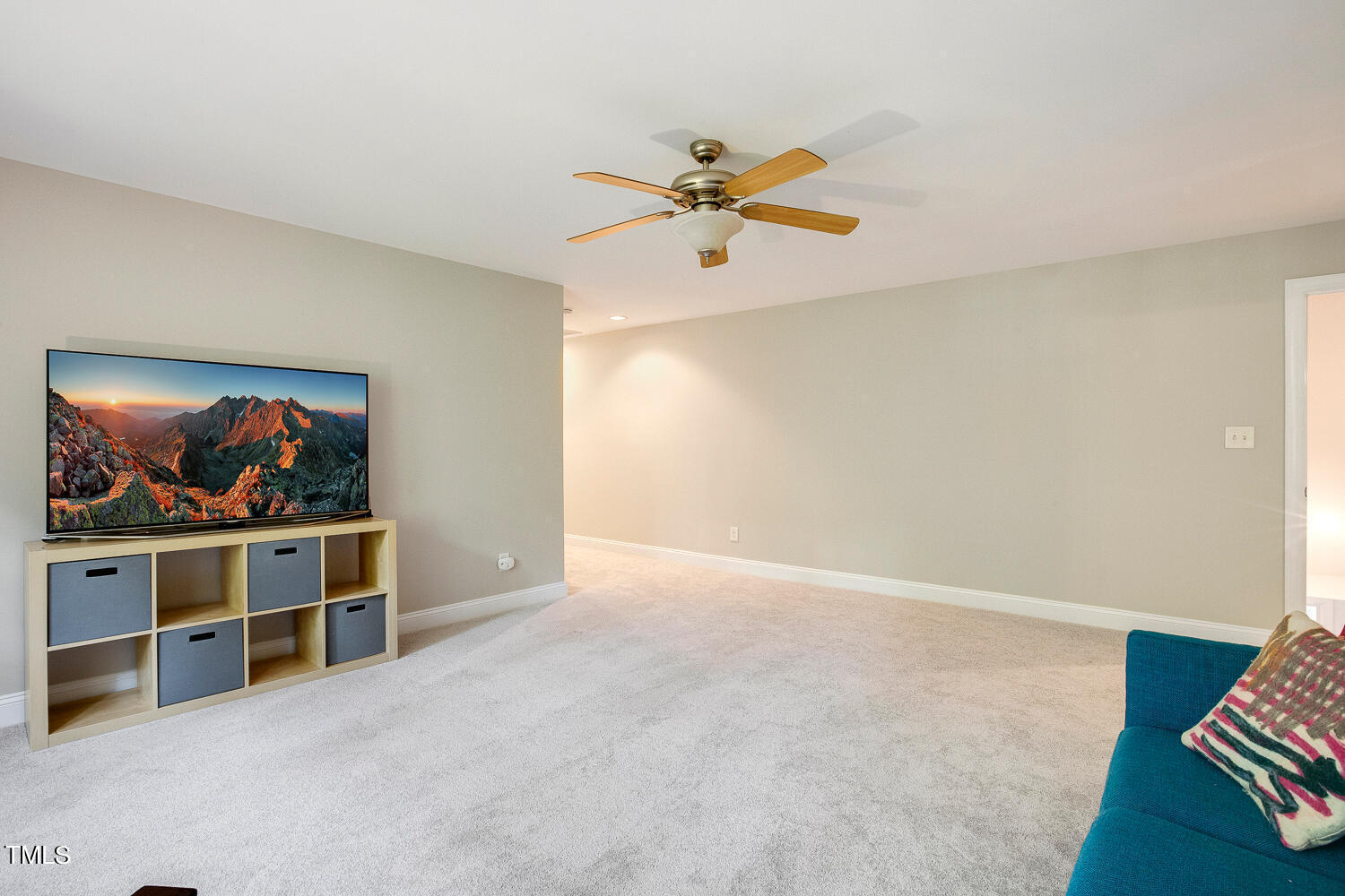 5809 Garrett Road Durham, NC 27707 - Photo 38 of 66 a view of a livingroom with a chandelier fan and windows
