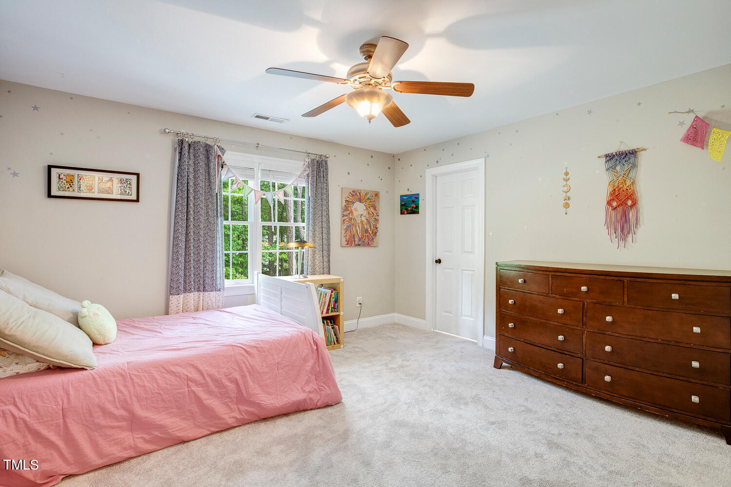 5809 Garrett Road Durham, NC 27707 - Photo 43 of 66 a spacious bedroom with a bed and a window