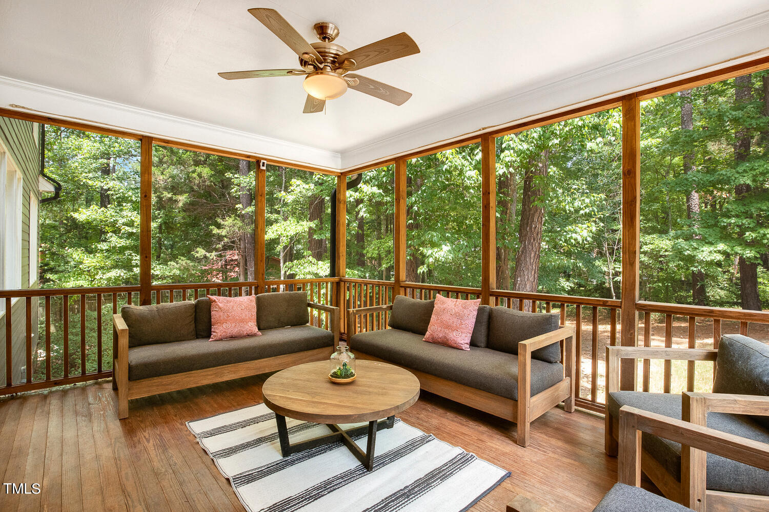 5809 Garrett Road Durham, NC 27707 - Photo 49 of 66 a living room with furniture and a large window