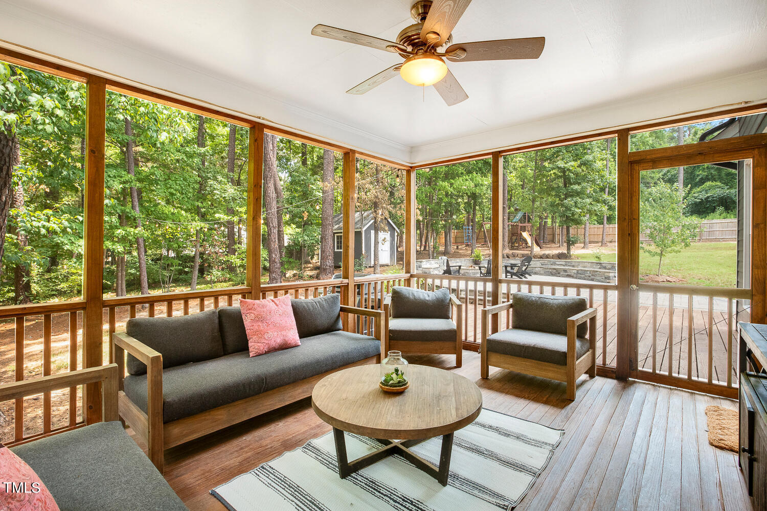 5809 Garrett Road Durham, NC 27707 - Photo 51 of 66 a living room with furniture and a large window