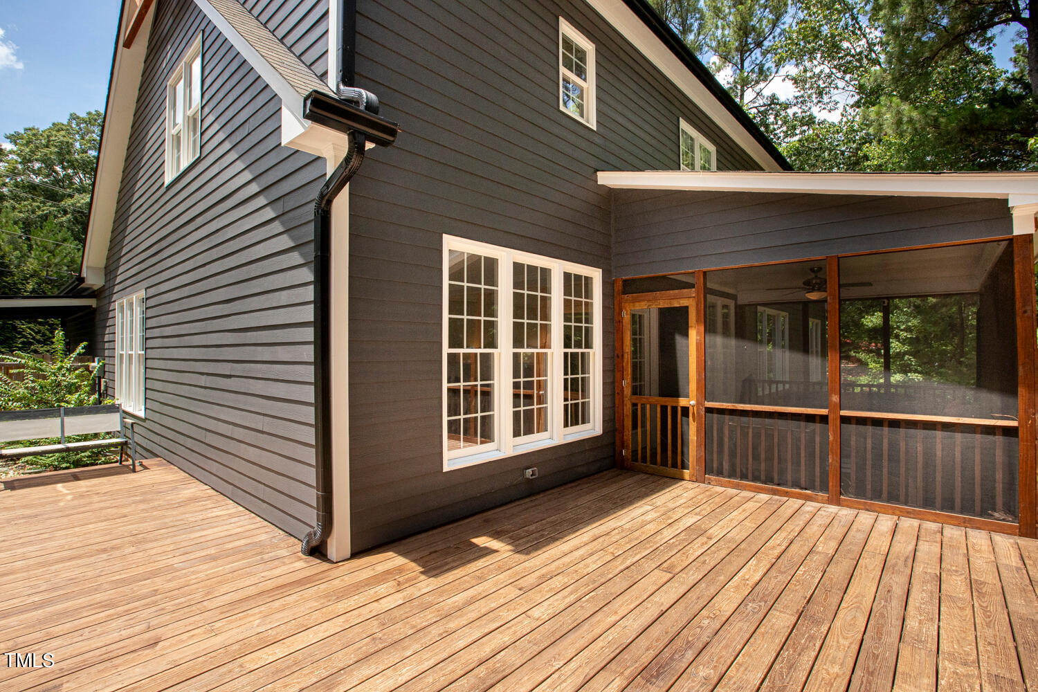 5809 Garrett Road Durham, NC 27707 - Photo 52 of 66 a view of a house with a roof deck