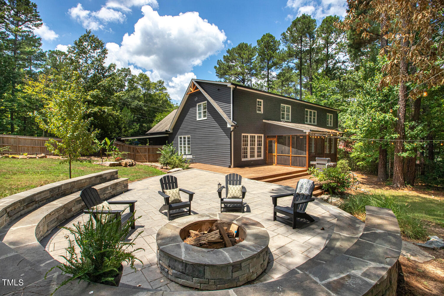 5809 Garrett Road Durham, NC 27707 - Photo 56 of 66 a front view of a house with swimming pool having outdoor seating