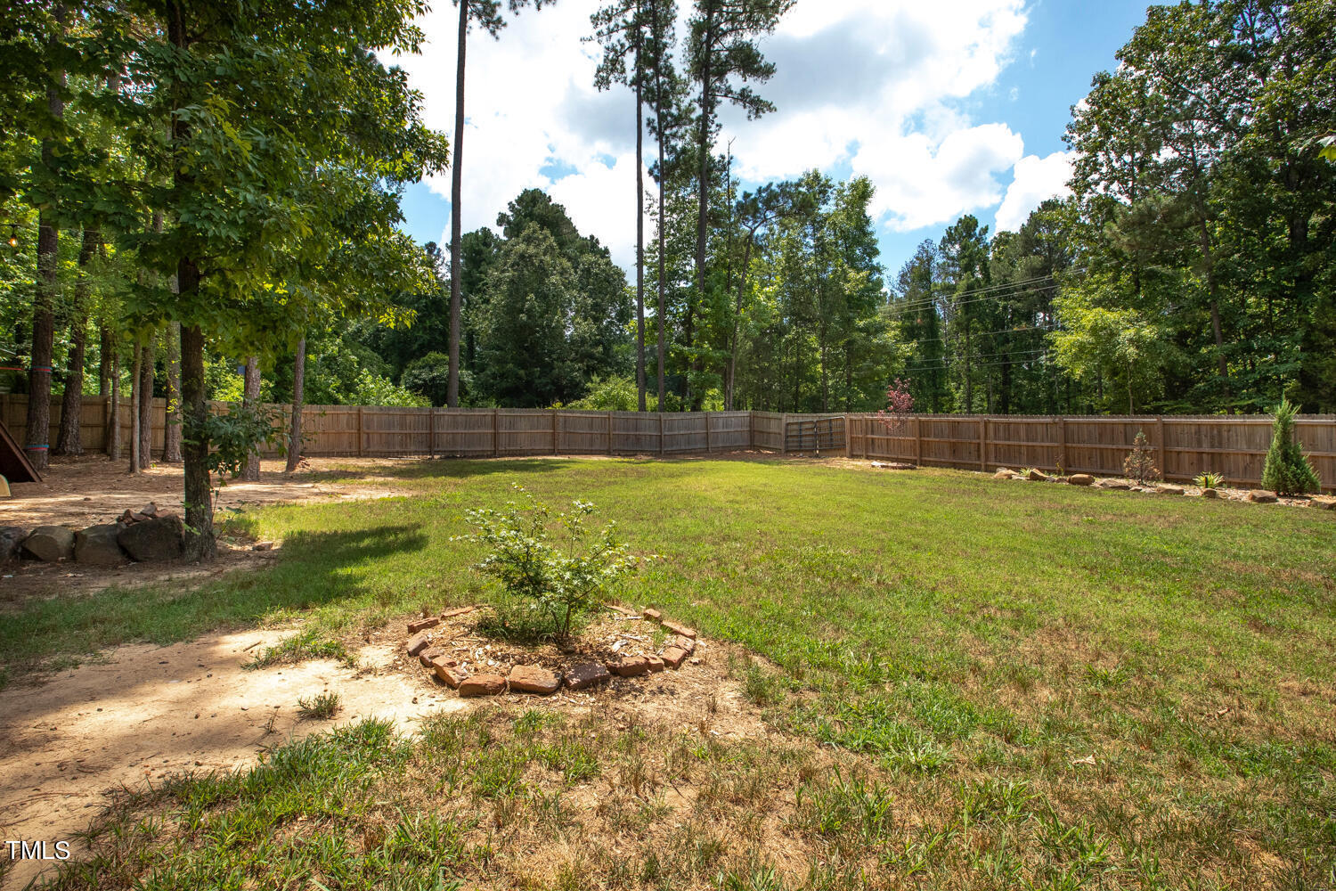 5809 Garrett Road Durham, NC 27707 - Photo 59 of 66 a view of outdoor space with swimming pool and green space