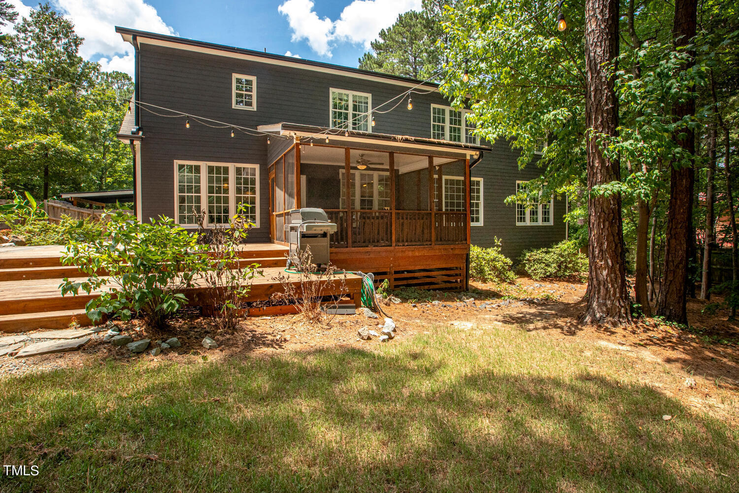 5809 Garrett Road Durham, NC 27707 - Photo 61 of 66 a view of a house with backyard and sitting area