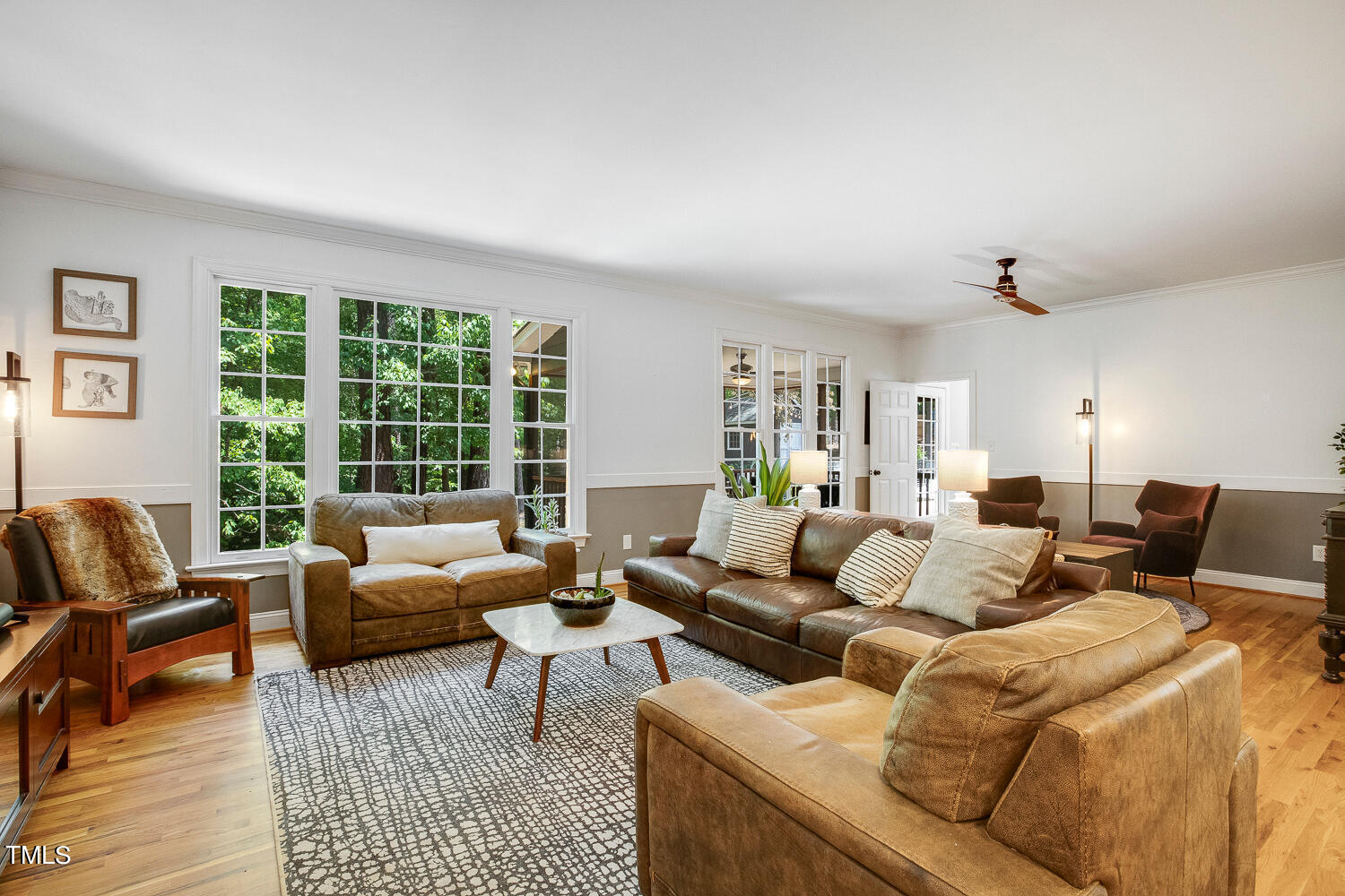5809 Garrett Road Durham, NC 27707 - Photo 8 of 66 a living room with furniture and a large window