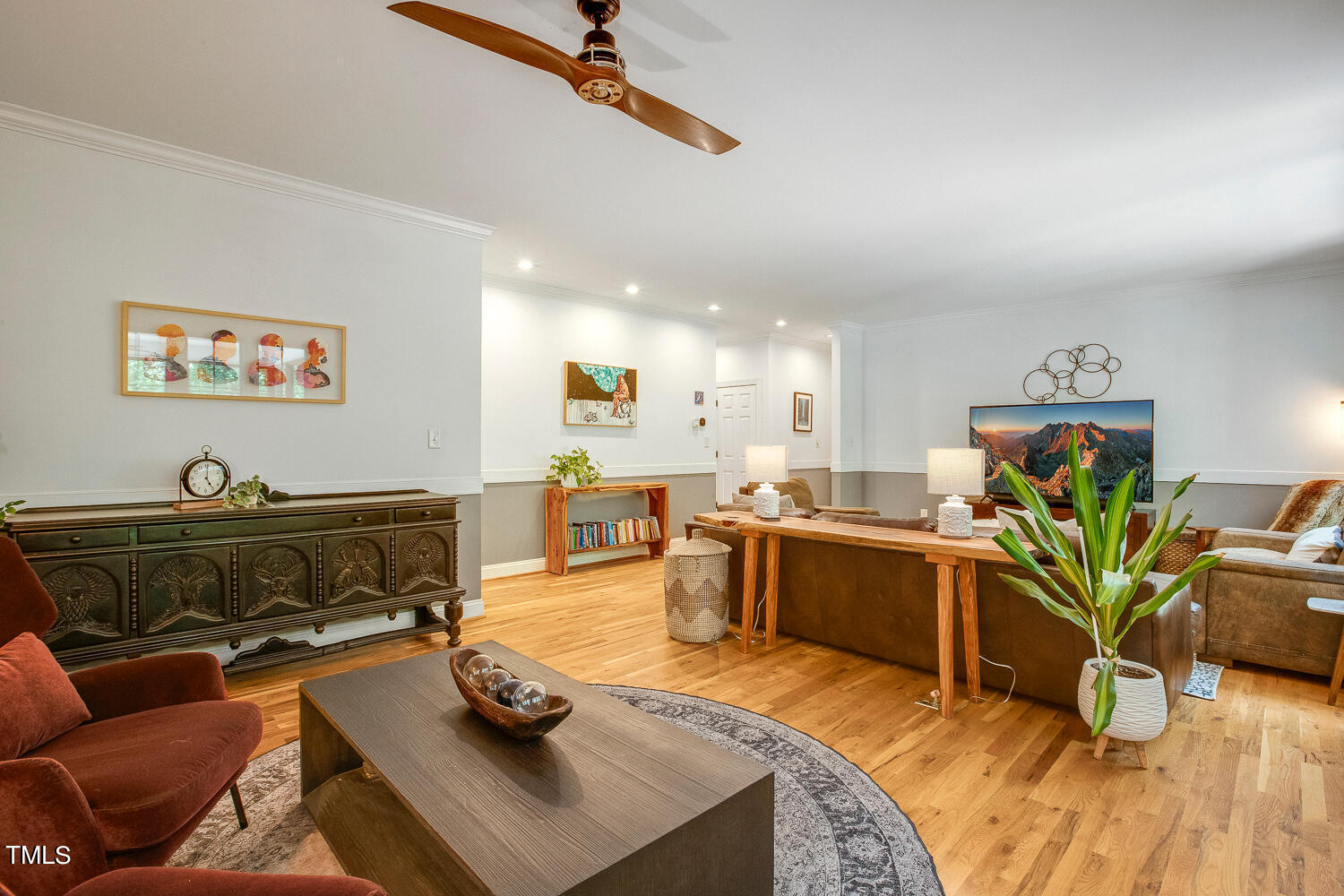 5809 Garrett Road Durham, NC 27707 - Photo 10 of 66 a living room with furniture and wooden floor