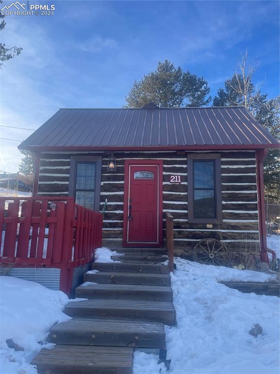 211 5th Street Victor, CO 80860 - Photo 20 of 22 a front view of a house