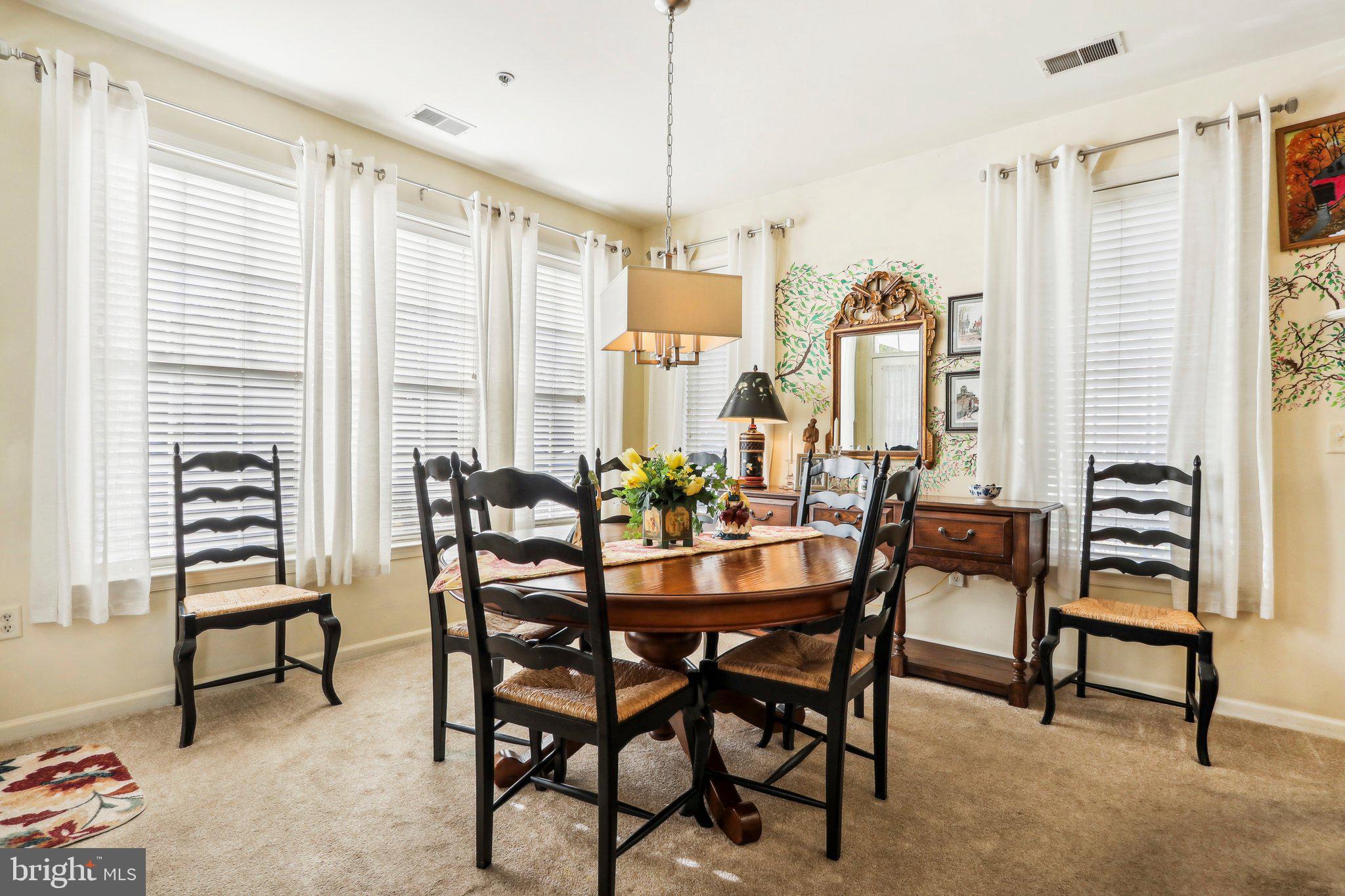 113 Kyle Way Ewing, NJ 08628 - Photo 13 of 42 a view of a dining room with furniture and a window